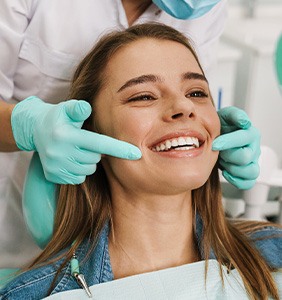 visit your dentist regularly to keep your teeth healthy and strong