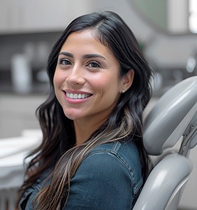 Smiling woman sitting in treatment chair