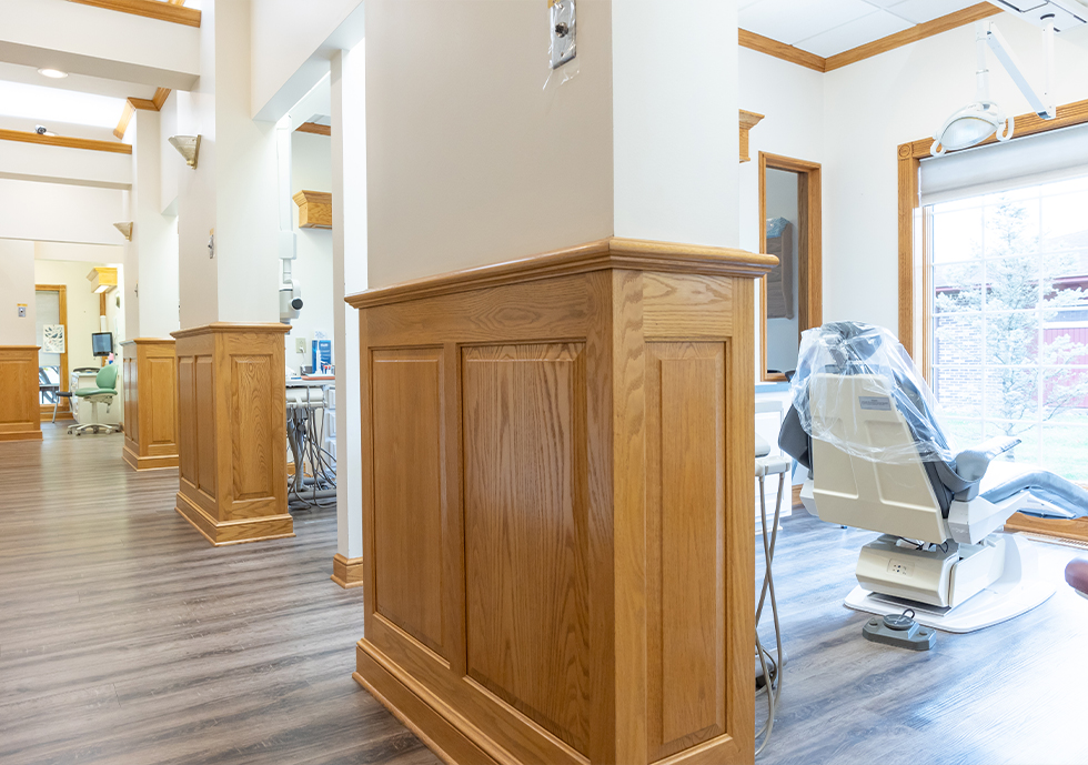 Hallway branching off into dental treatment rooms